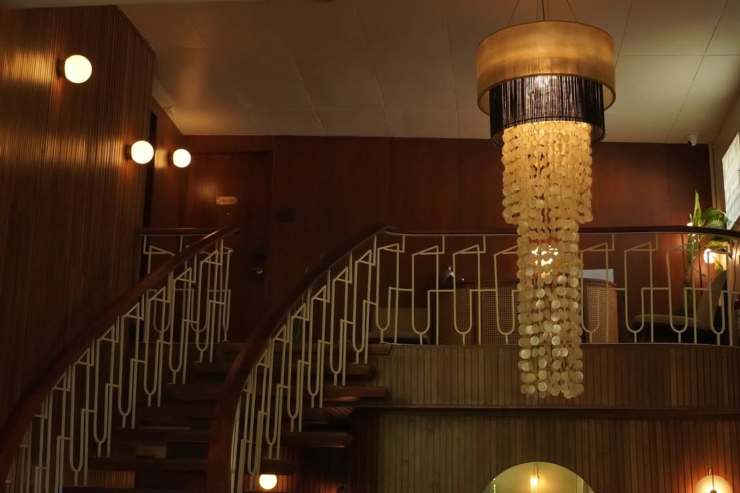 Staircase with capiz chandelier