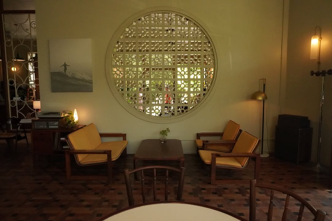 Lewis House circular breeze block window lounge interior